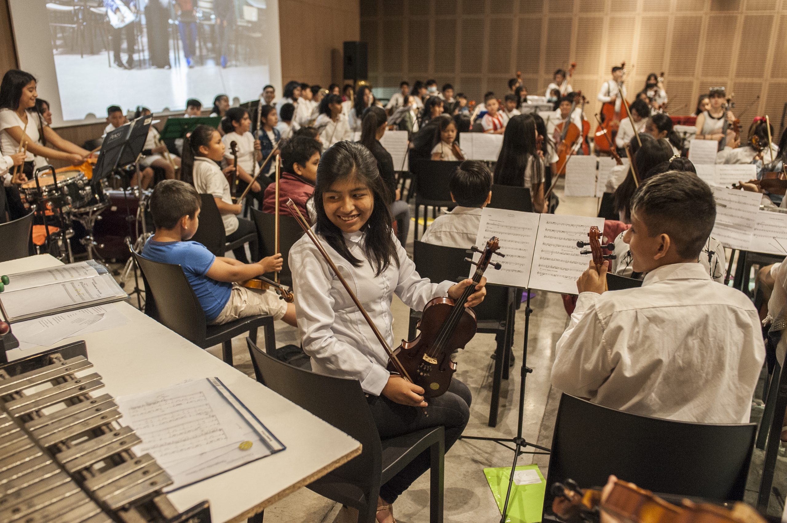 Imagen muestra a la orquesta en el auditorio del Museo en 2022